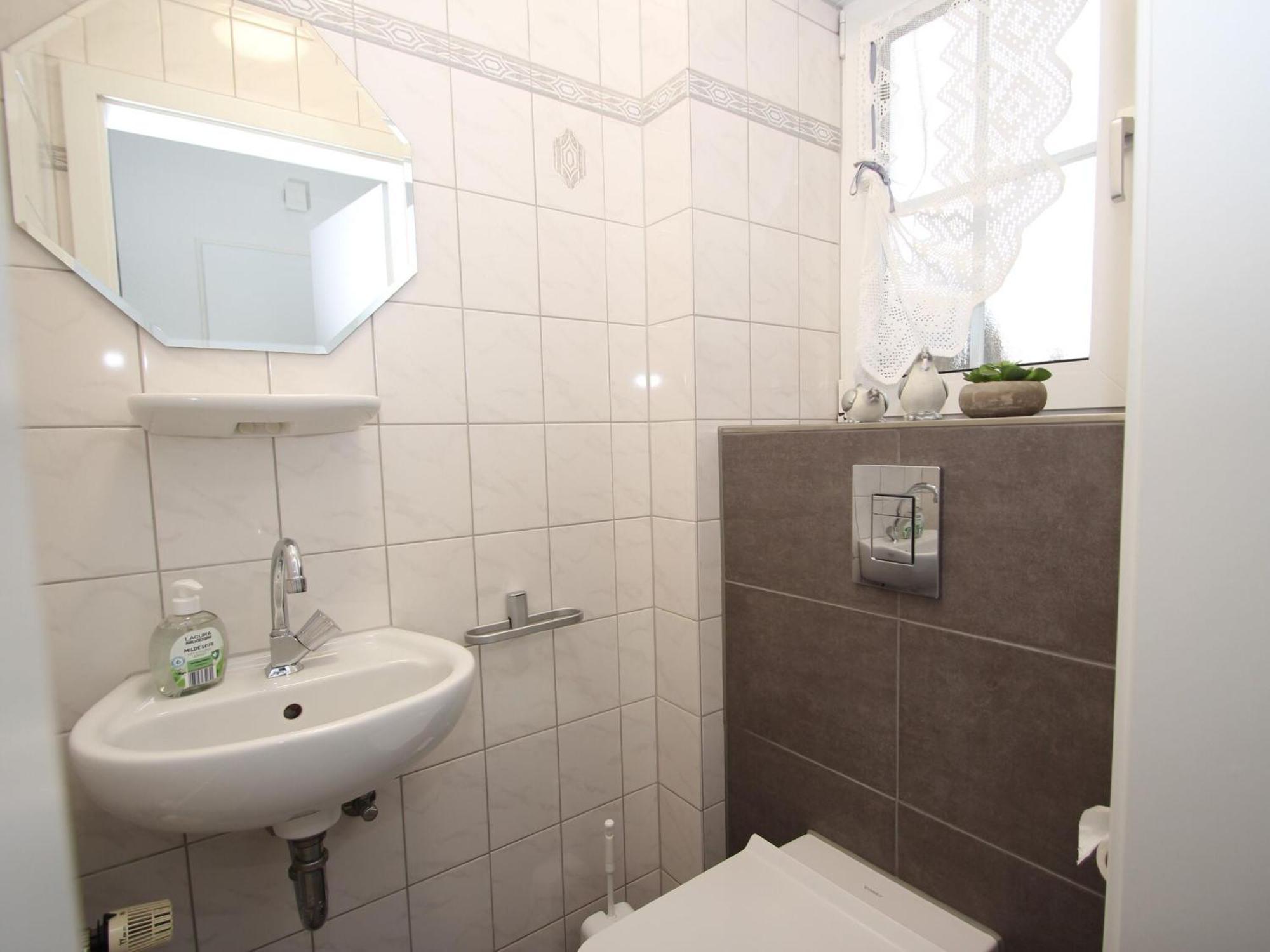 Renovierte Doppelhaushaelfte In Neßmersiel Exterior foto